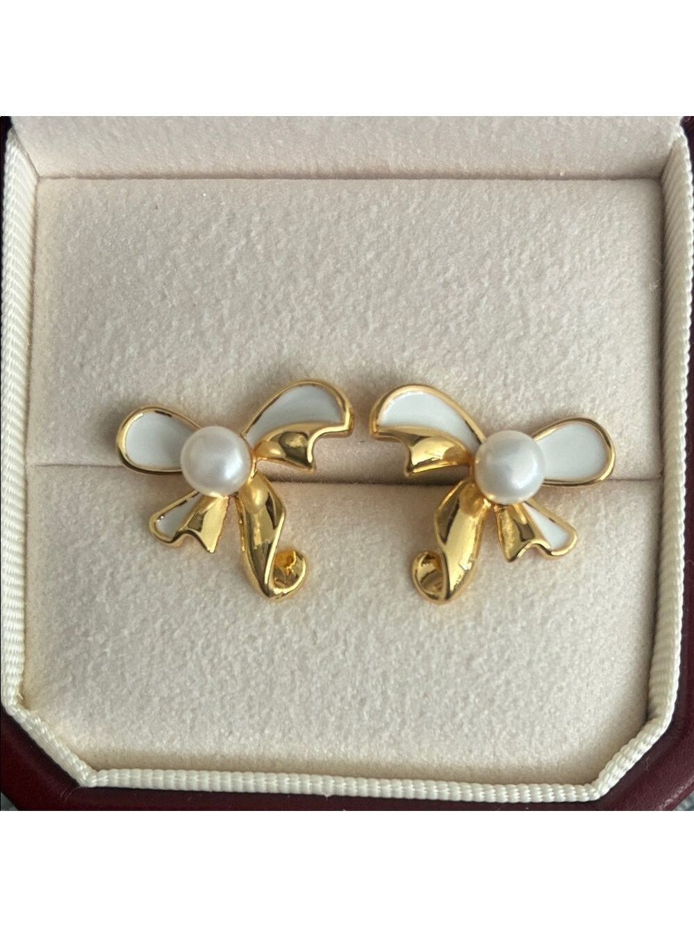 Elegant Gold and White Bow Earrings